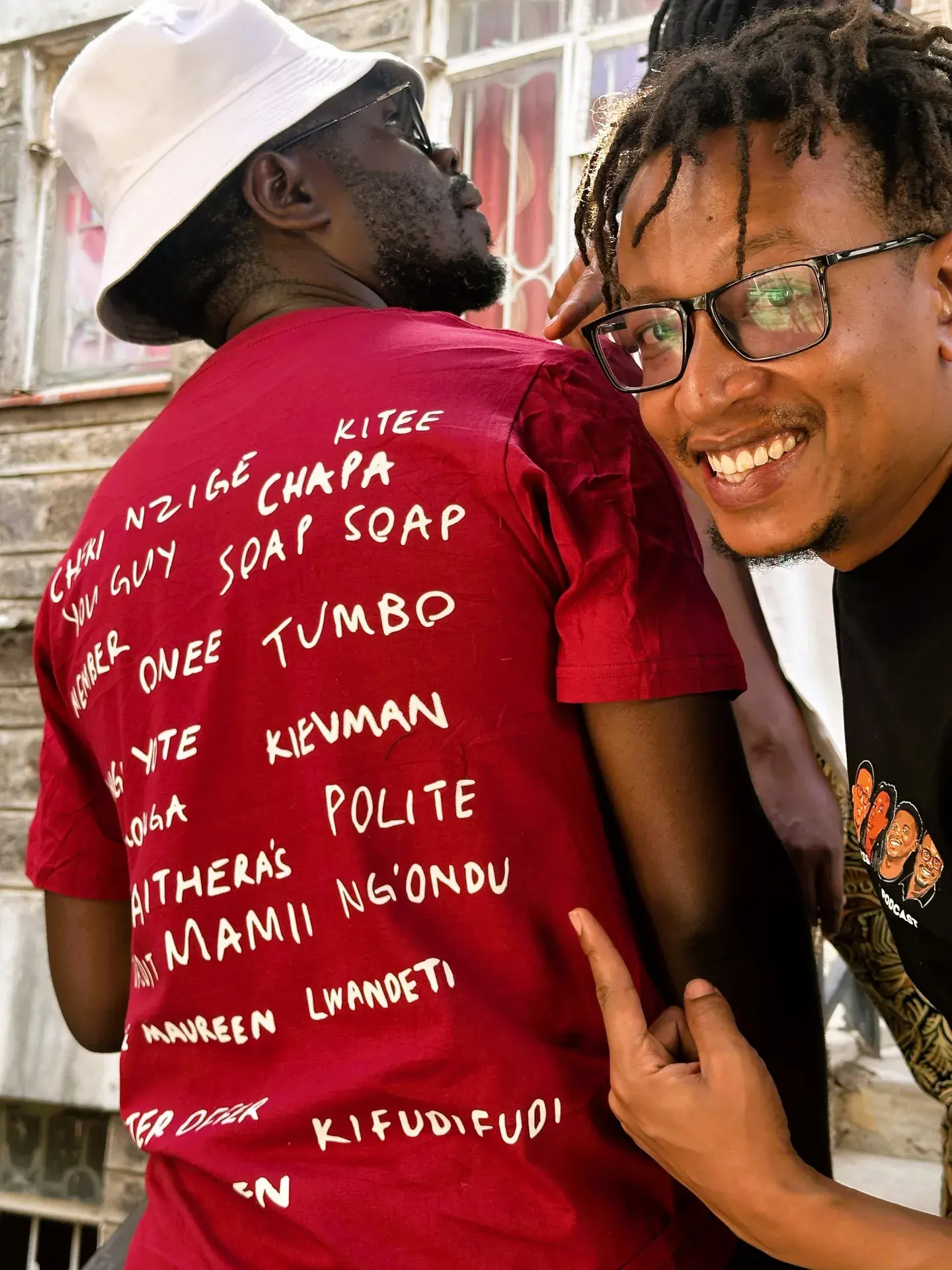 A tee printed on the back with the show's catchphrases